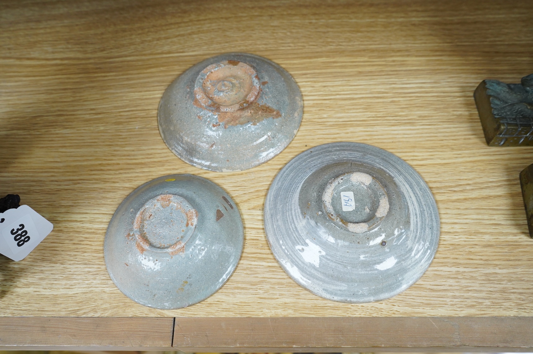 A Korean celadon dish and two Korean Pongchong dishes, Goryeo dynasty, largest 13cm